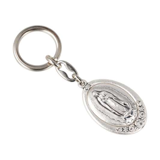 Keychain Guadalupe Oval Silvery With Flowers. Souvenirs from Italy