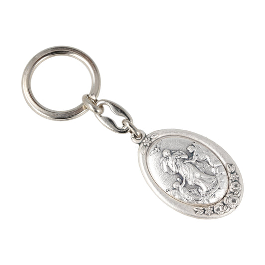Keychain Mary Undoes Silver Oval Knots With Flowers. Souvenirs from Italy