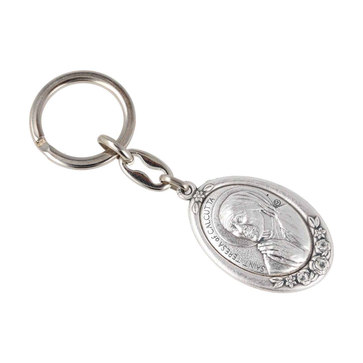 Keychain Mother Teresa of Calcutta Silver Oval With Flowers. Souvenirs from Italy