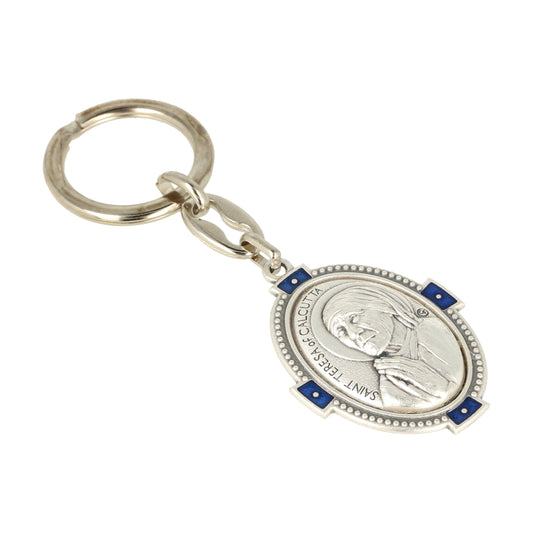 Keychain Mother Teresa of Calcutta Oval Deco Blue. Souvenirs from Italy